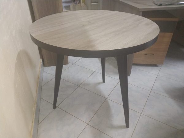 Round wooden dining table