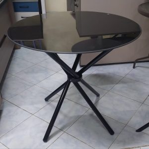Round dark glass dining table