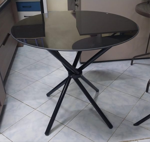 Round dark glass dining table