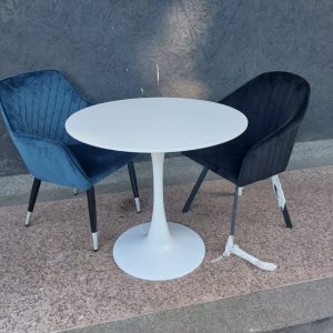 A white 2-seater patio table set.