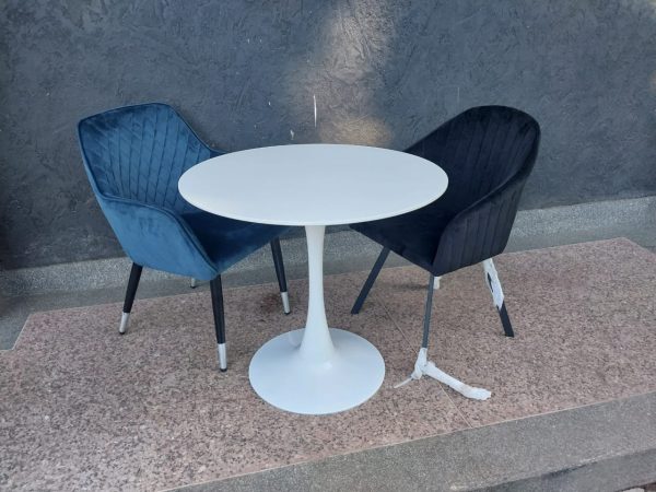 A white 2-seater patio table set.