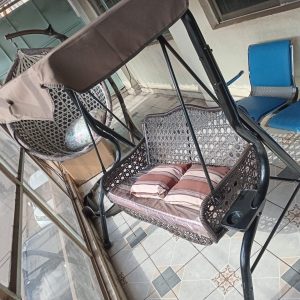 Woven wicker hammock swing